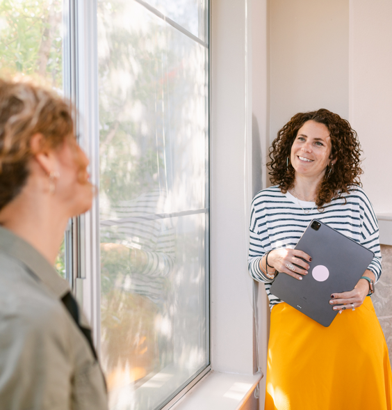 Woman holding laptop