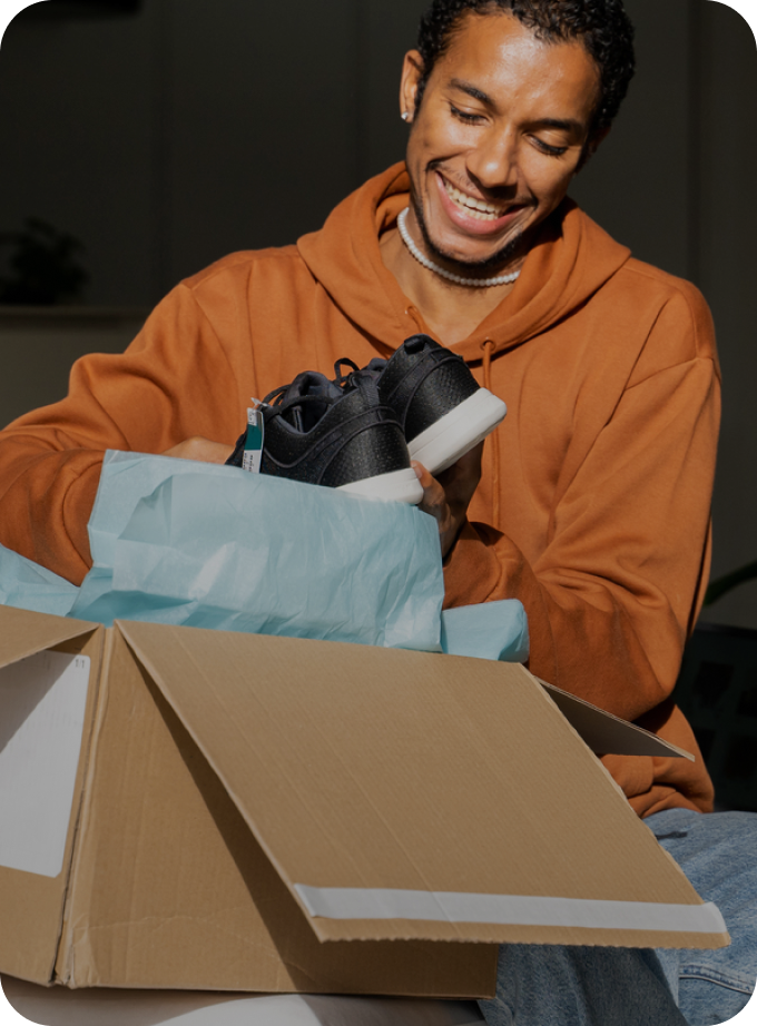 Man holding a shoe box