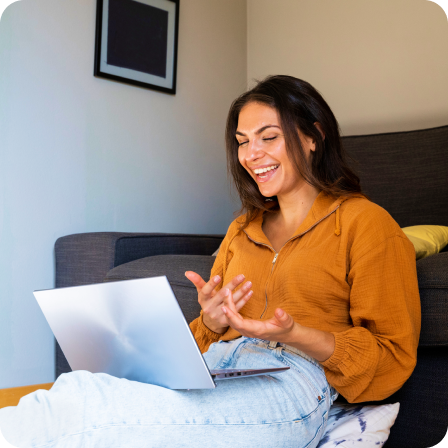 Woman having video call using laptop