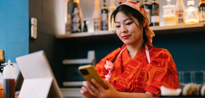Woman looking at her cell phone