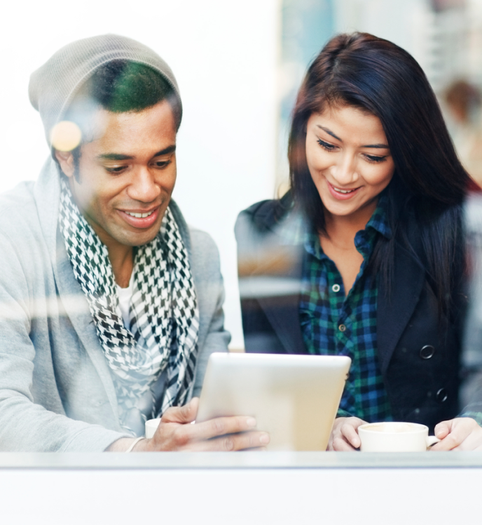 People looking at iPad