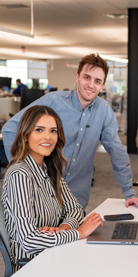 Two people looking at camera